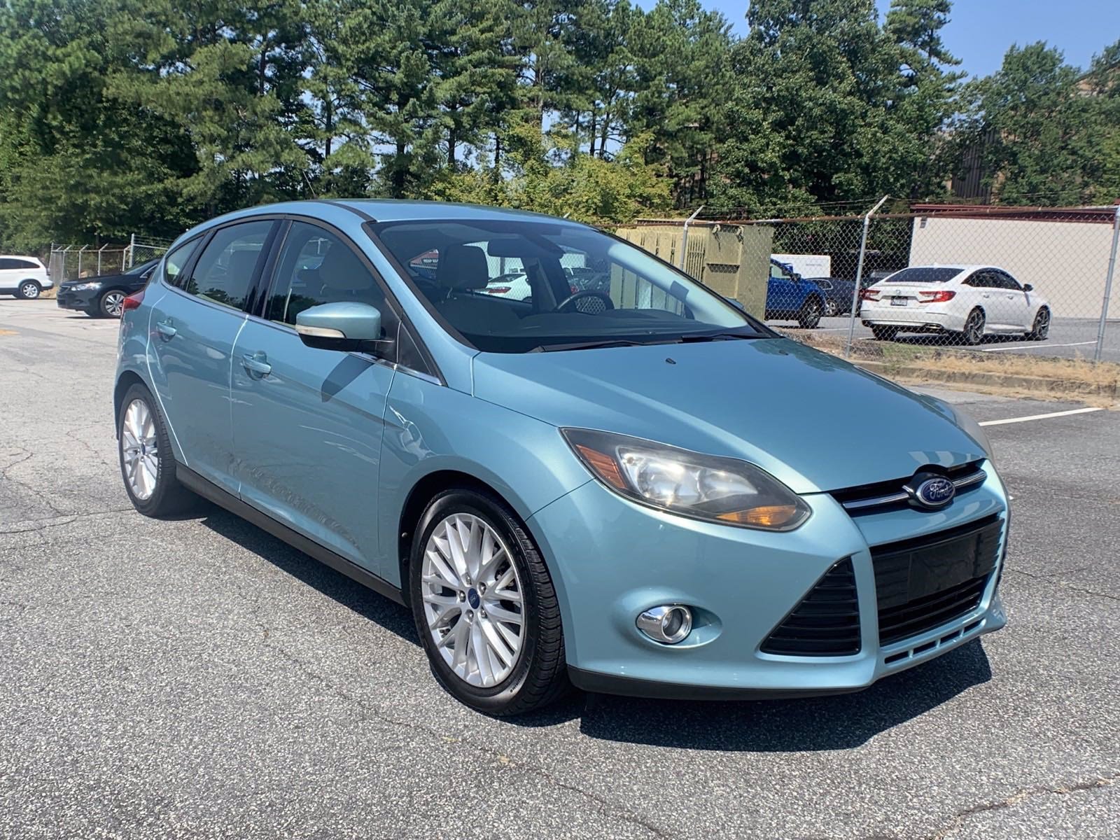 PreOwned 2012 Ford Focus SEL Hatchback in 287656A Ed